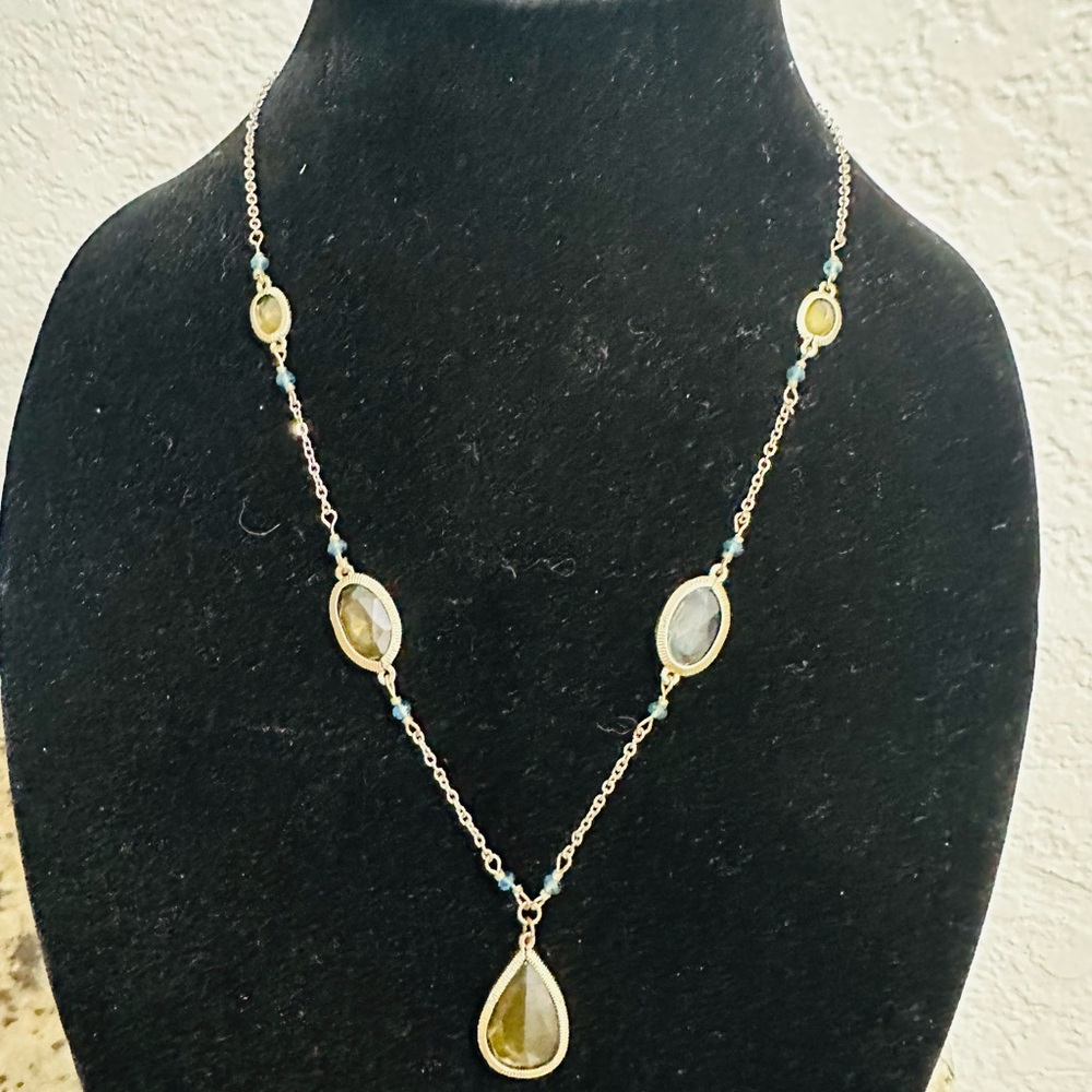 Elegant Gold and Silver Teardrop Necklace with Gemstone Accents